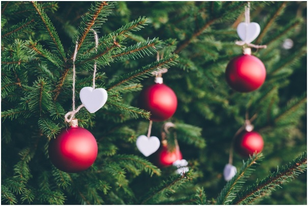 Red baubles on green christmas tree